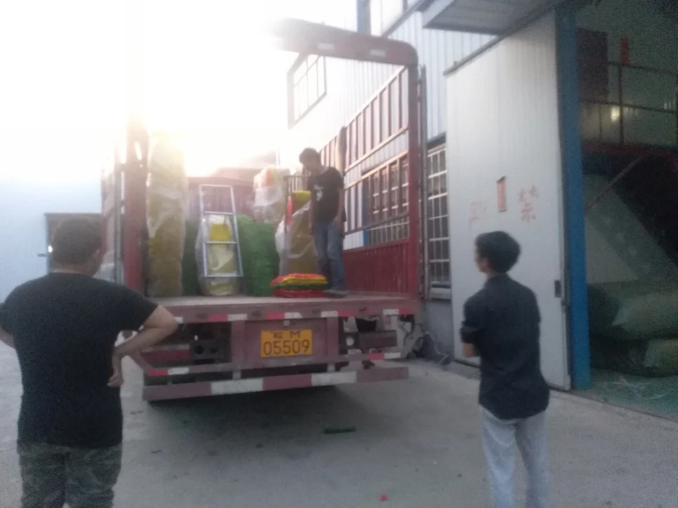 Display components being loaded into a vehicle.