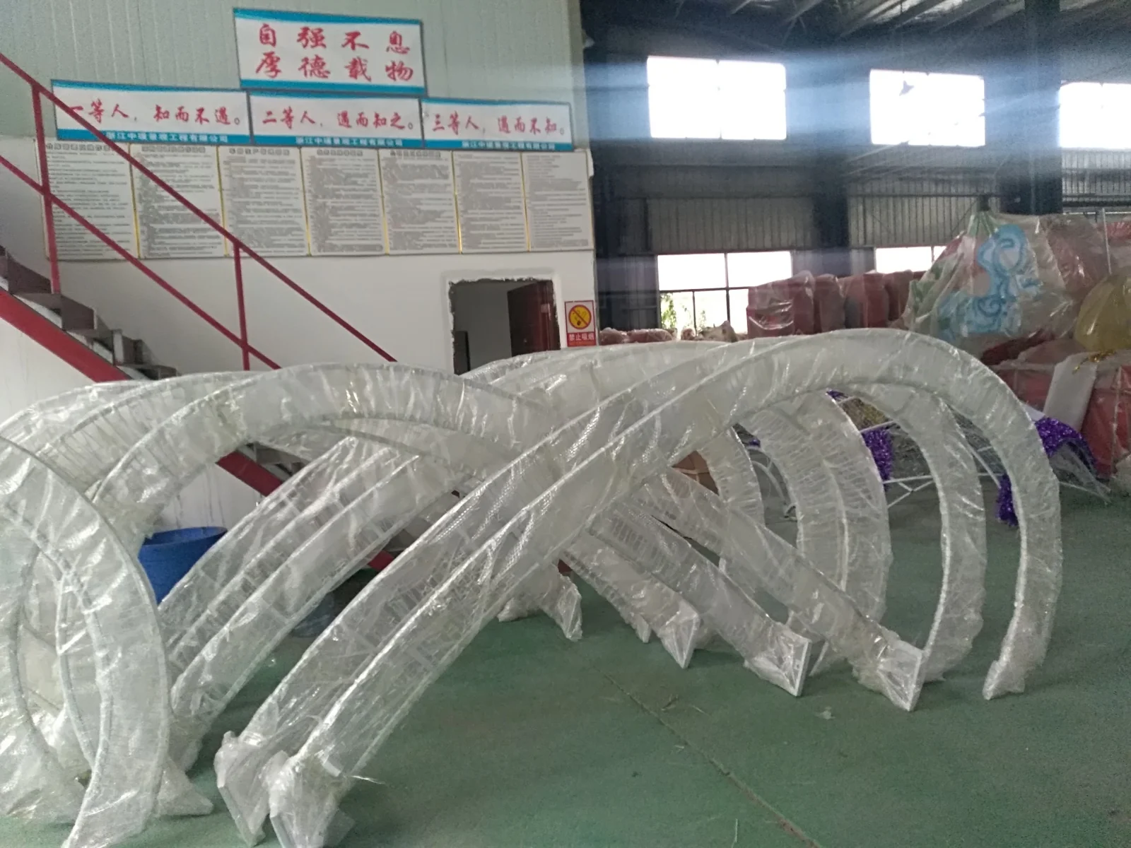 Wrapped decorative light frames prepared for handling.