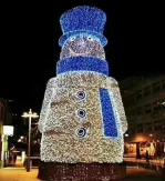 Snowman Light Sculpture catalogue design reference